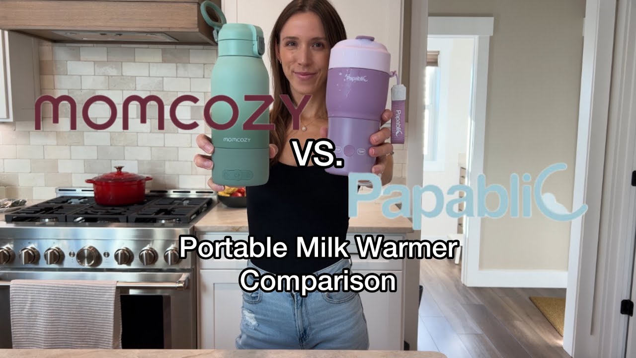 A woman compares two portable milk warmers—momcozy (teal) and Papablic (purple)—in a modern kitchen.