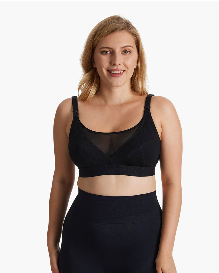 Translation missing: fr.Woman wearing a black ultra-soft and cool breeze pumping and nursing bra HF018 by Momcozy, showcasing adjustable straps and comfortable design. New product badge displayed on top-right corner