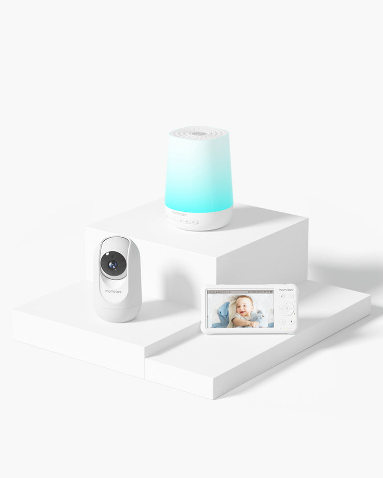 Translation missing: fr.Momcozy Baby Care Bundle with smart baby sound machine, baby monitor camera, and baby monitor screen displaying a baby. Essential products for baby care
