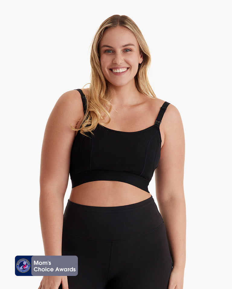 Translation missing: en.Blonde model in The Original black basic pumping bra with adjustable straps and wide underband for comfortable fit