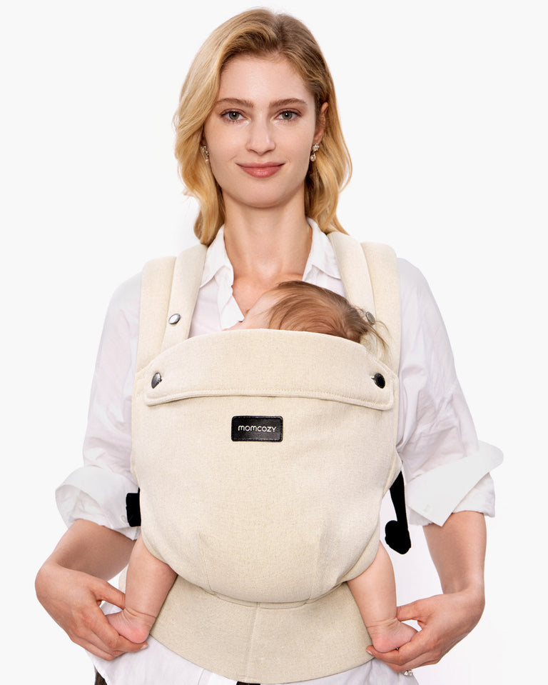 Translation missing: fr.Momcozy PureHug baby carrier in beige, comfortable babywearing for mother and baby, promotes bonding